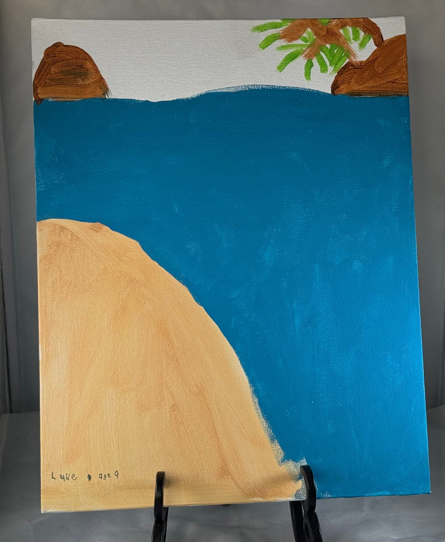 Kid art for sale to help those in need. Pictured "Beach Vacation" by Luke L. (Canvas Panel, 14" x 11")