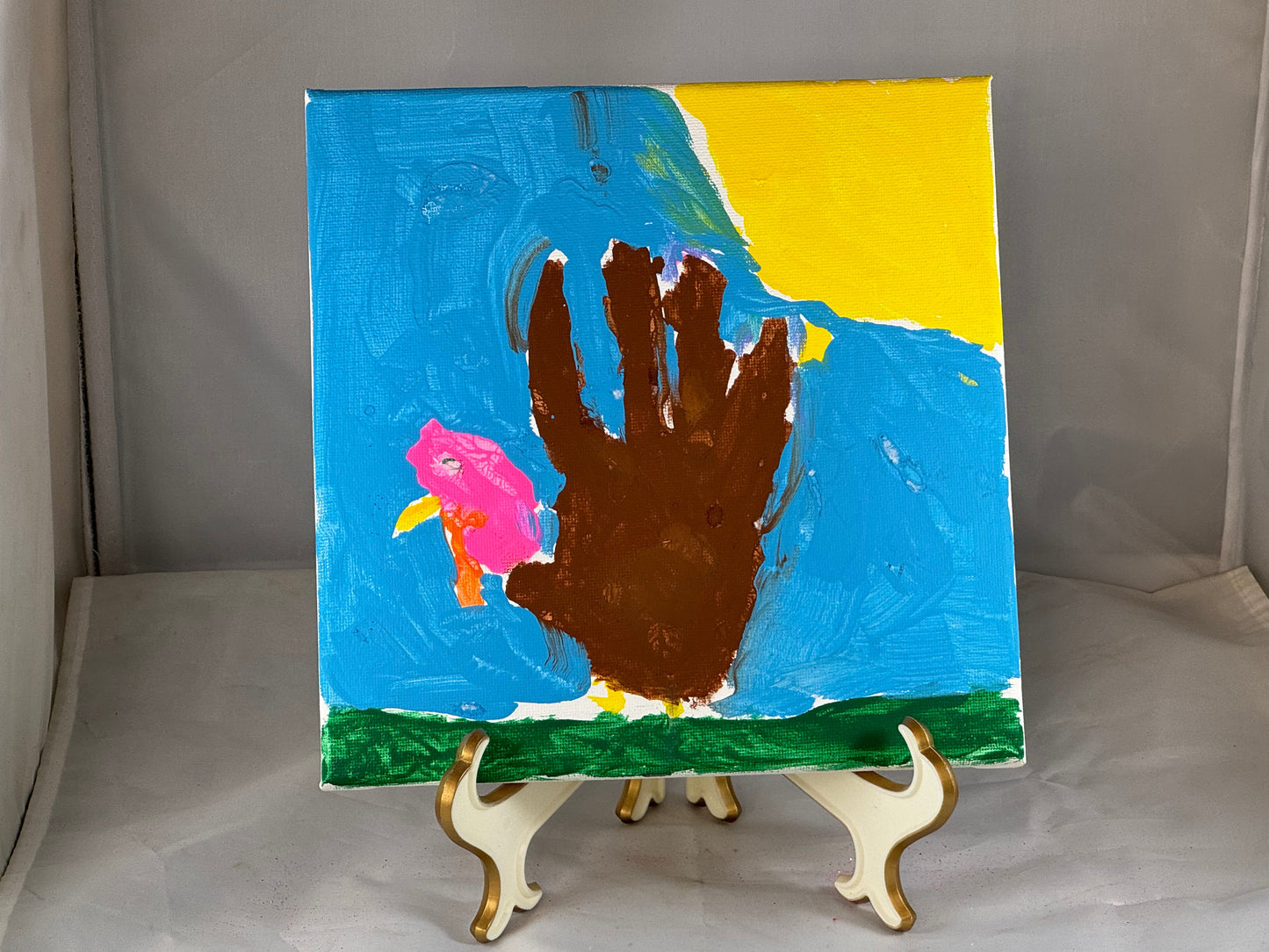 Kid art for sale to help those in need. Pictured "Hand Turkey", Cub Scout Pack 684 (Canvas, 8" x 8")