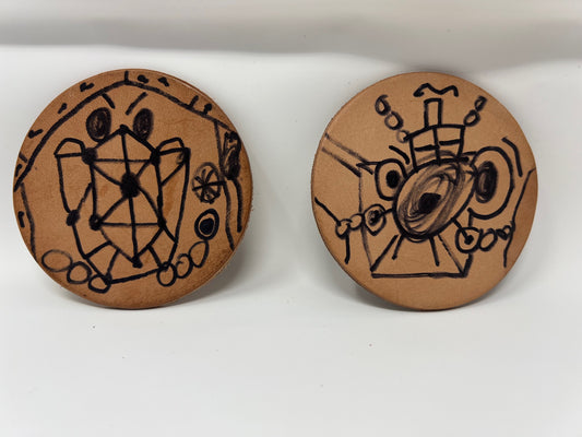 "Electro Roller Coaster Twins" by Zane M. (Leather, 3" Diameter, Set of 2)