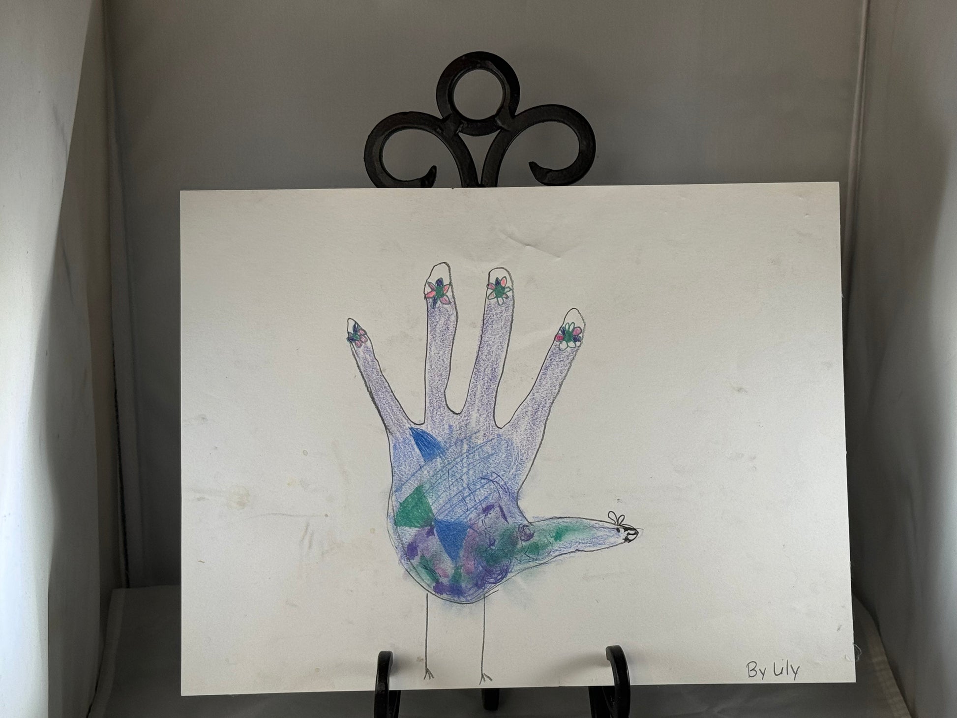 Kid art for sale to help those in need. Pictured "Hand Turkey" by Lily B. (Art Paper, 9" x 12")