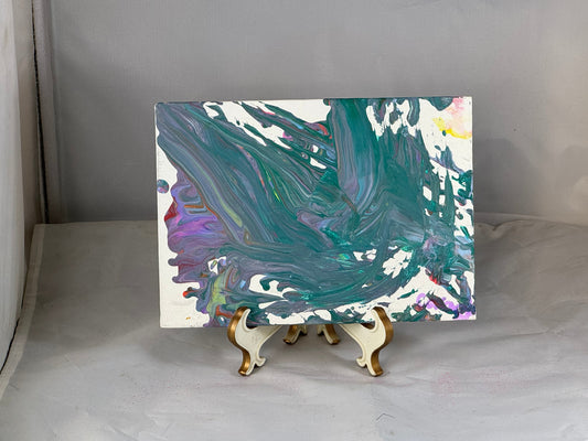 Kid art for sale to help those in need. Pictured "Mustache Wave" by Zane M. (Canvas Panel, 5" x 7")